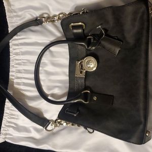 Brand new with tags.Michael Kors Hamilton Black EW Satchel with dustbag.